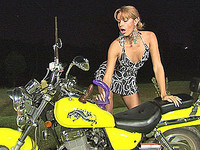 Andrea strokes and toys on a motorcycle