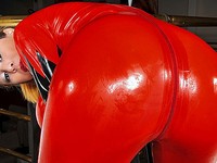 Big dick babe in hot red latex makes your mouth water